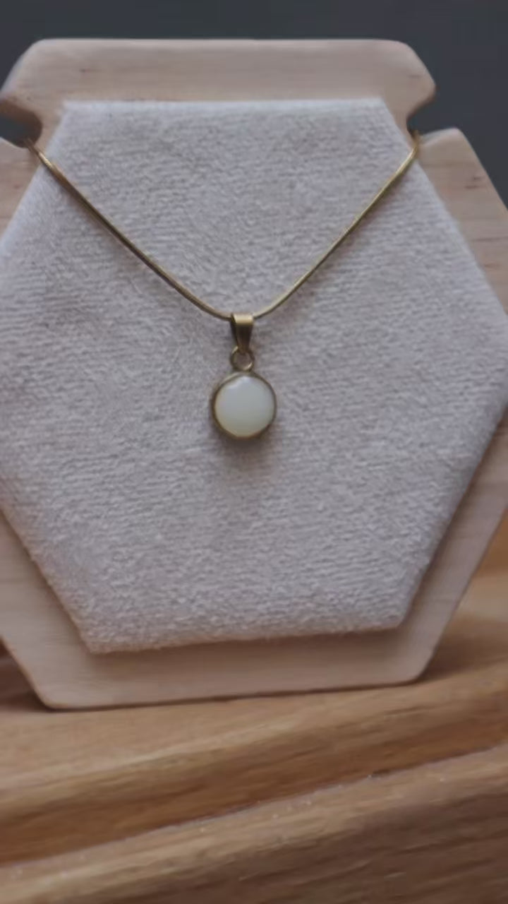 Colgante con leche materna